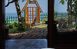 Main room offers luxury, while the second is cozy and slightly smaller, both with sea view.